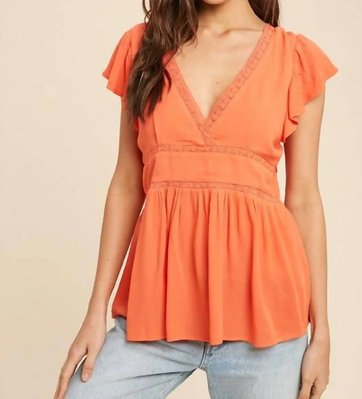 Fashionista Favorites Holly Flutter Sleeve Tie-Back Top In Coral