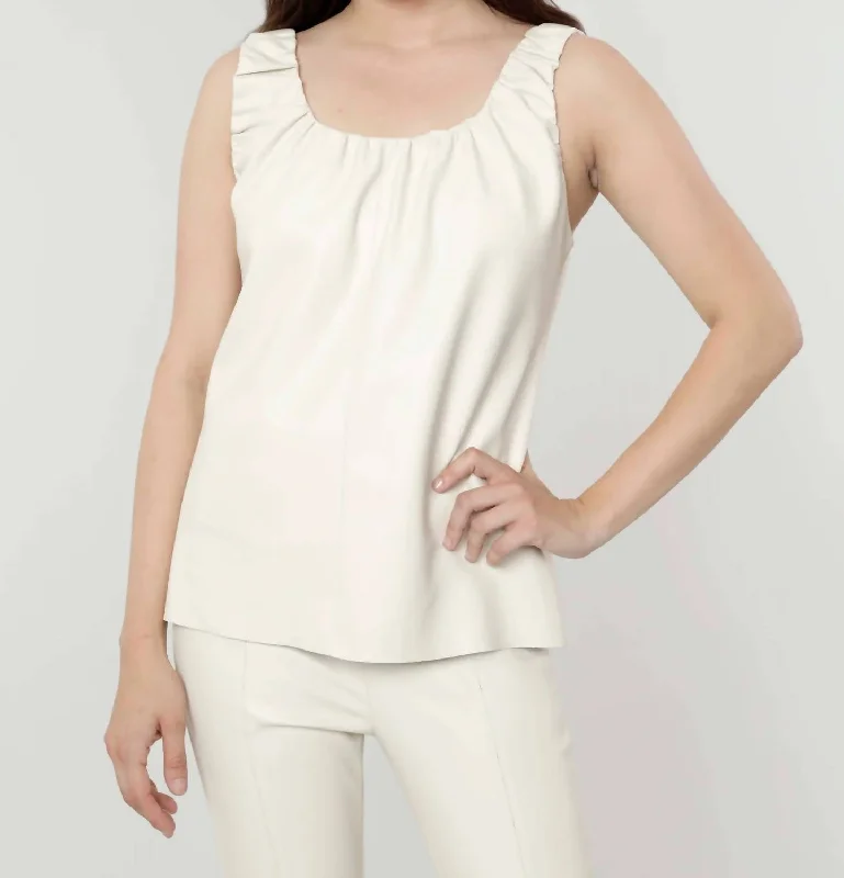 Classic Modern Offers Vegan Leather Top In Cream